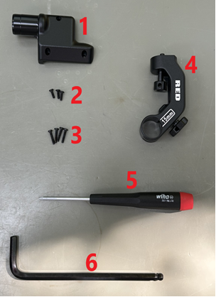 A set of tools on a table

Description automatically generated